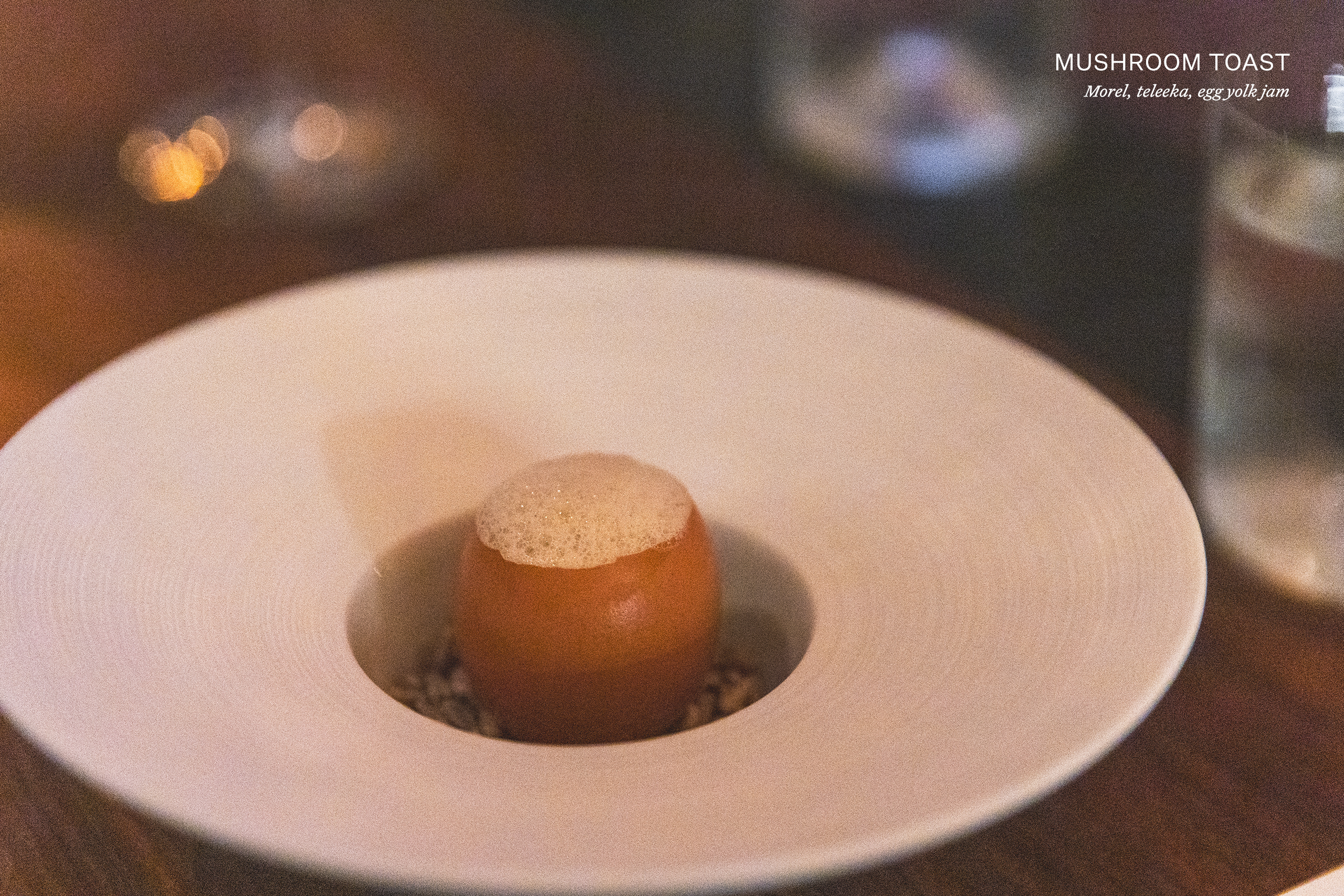 Mushroom toast with morel, teleeka, and egg yolk jam